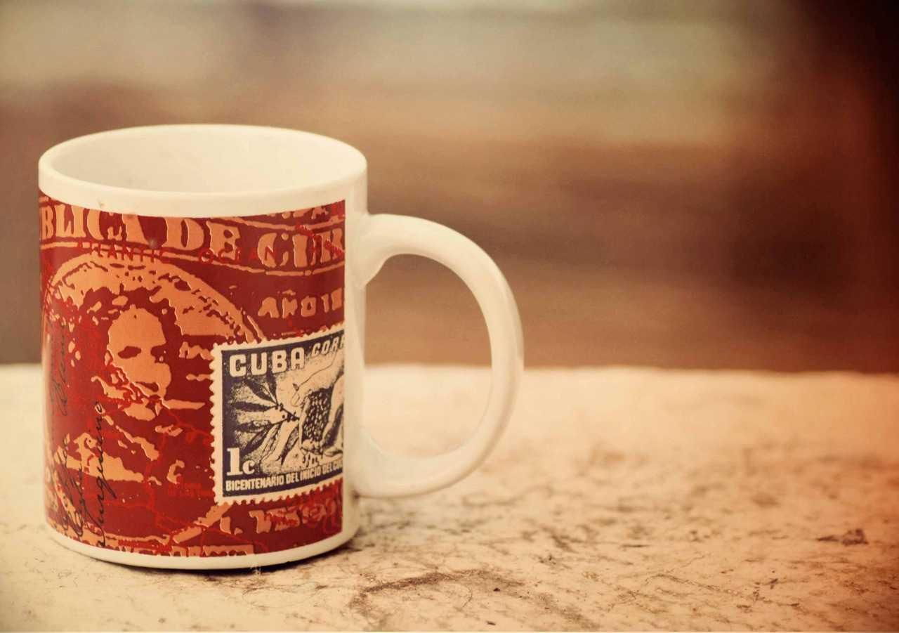 This is a CUp of coffee on a table